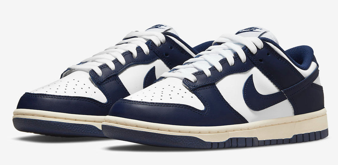 The Nike Dunk Low Vintage Navy emerges exclusively for the ladies